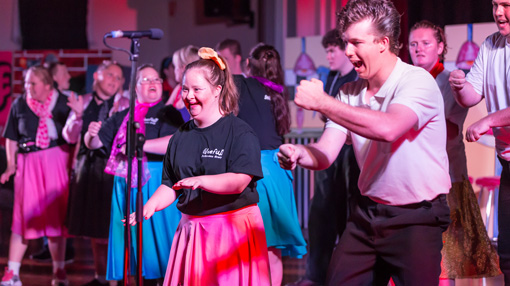 delineate 2014 participants on stage in grease the musical